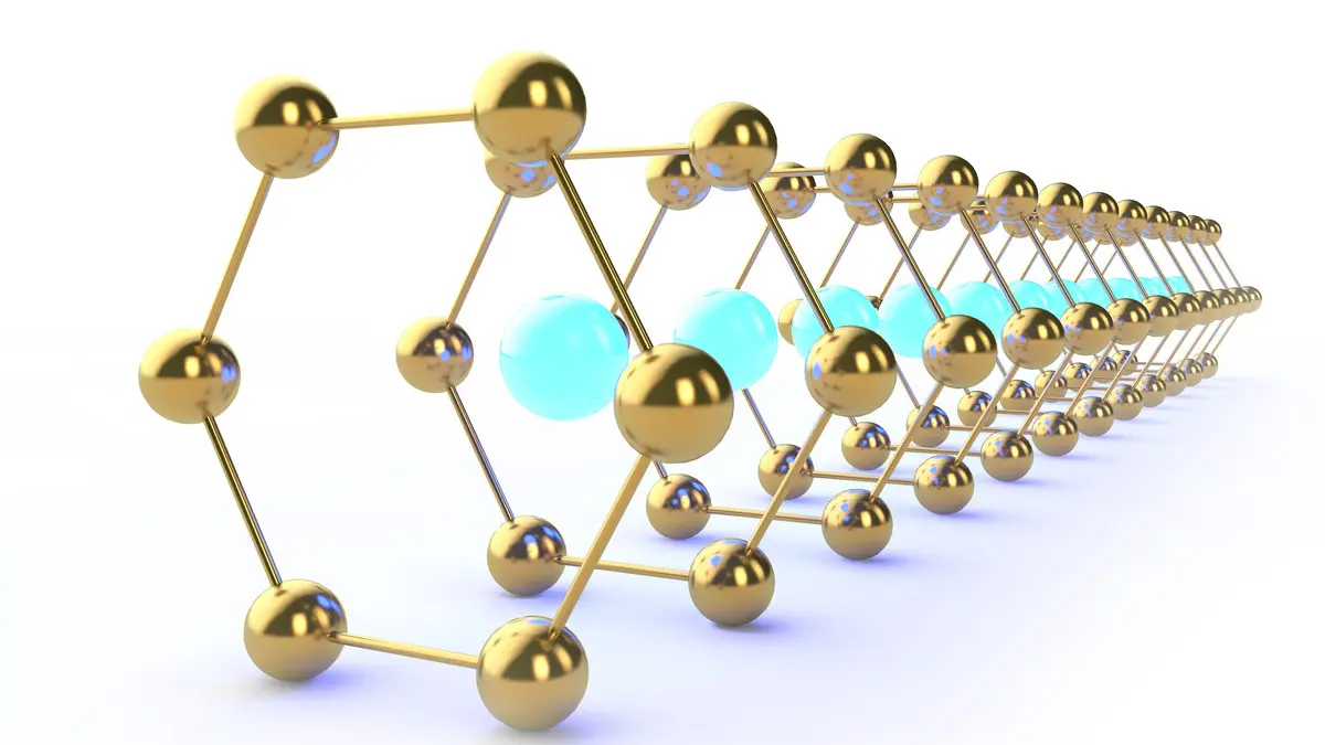 A three-dimensional rendering of a regular crystal lattice of golden spheres joined by rods, threaded by a row of glowing blue spheres receding into the distance
